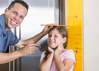 what is the average height of an 11-year old in feet