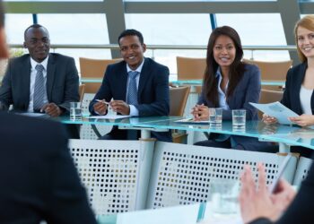 in 1972, what association made borrowing money to attend college much easier than it had been?