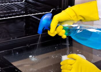 a food handler notices cleaning liquid