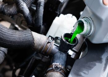 how long should i wait to put coolant in my car