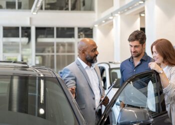 a car dealer who does not have enough customers for a supply of new cars faces